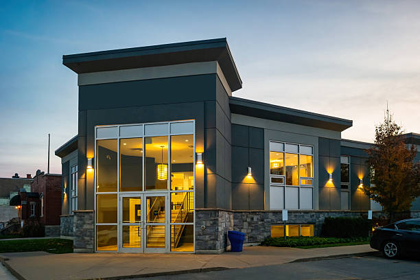 Office building with charcoal gray exterior paint and clean trim details by an exterior painter in Independence, OR.