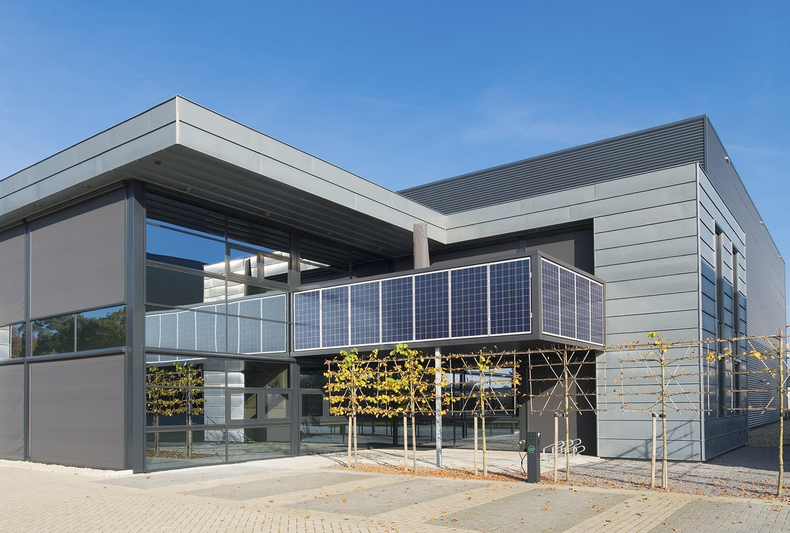 Commercial building with sleek gray exterior paint and smooth metal panel finishes by an exterior painter in Independence, OR.