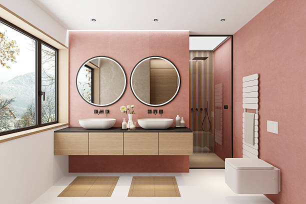Modern bathroom with dusty rose pink walls and clean finishes by an interior painter in Monroe, OR.